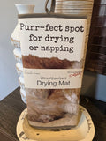 Purr-fect spot drying mat