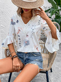 Ruffled Printed V-Neck Half Sleeve Blouse